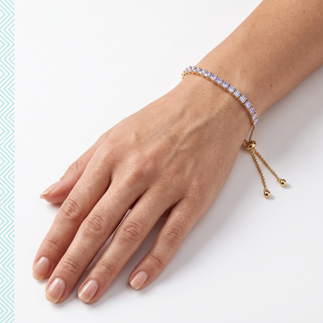 Bracelet Pacha en vermeil or 18 carats sur argent 925 porté au poignet, chaîne de réglage pendante